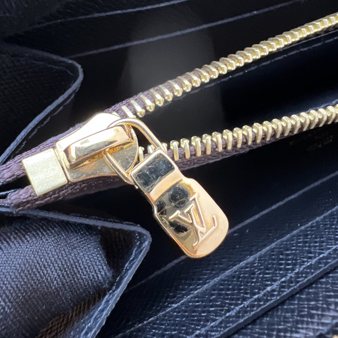 LV Clemence Zippy Long Wallet in Reverse Monogram Canvas and GHW