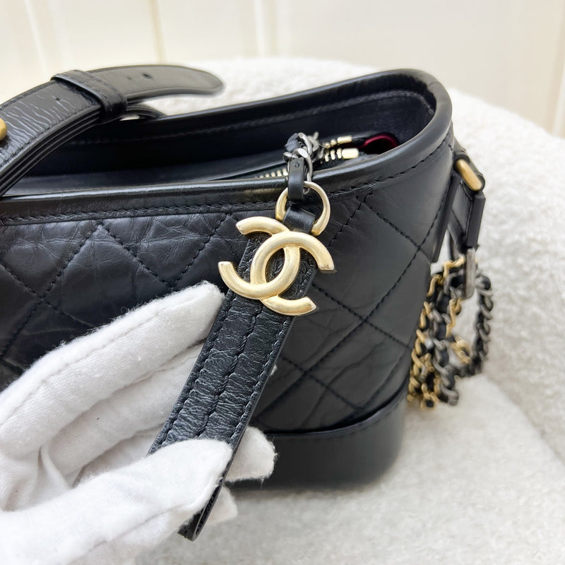 Chanel Small Gabrielle Hobo in Black Distressed Calfskin and 3 tone Hardware (Model: A91810)