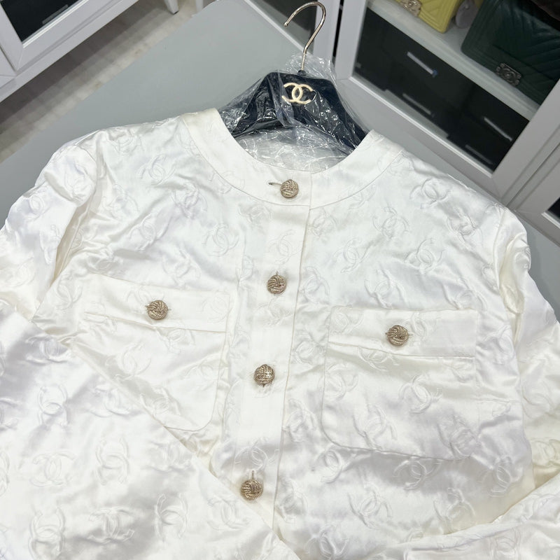 Chanel 25A Runway Embossed CC Logo Long Sleeved Blouse in Ecru Cotton and Silk (Model: P79802)