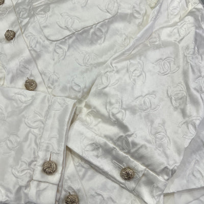 Chanel 25A Runway Embossed CC Logo Long Sleeved Blouse in Ecru Cotton and Silk (Model: P79802)