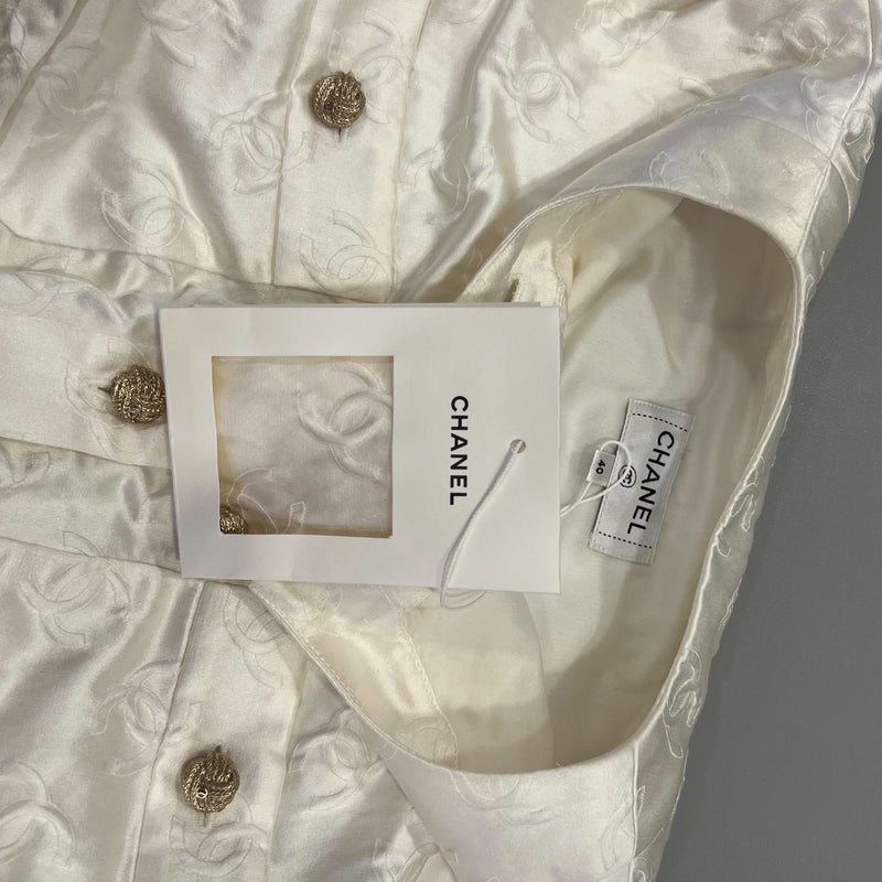 Chanel 25A Runway Embossed CC Logo Long Sleeved Blouse in Ecru Cotton and Silk (Model: P79802)