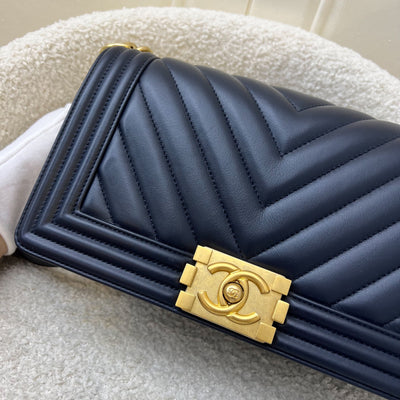 Chanel Medium 25cm Boy Flap in Chevron Quilted Navy Blue Leather and AGHW