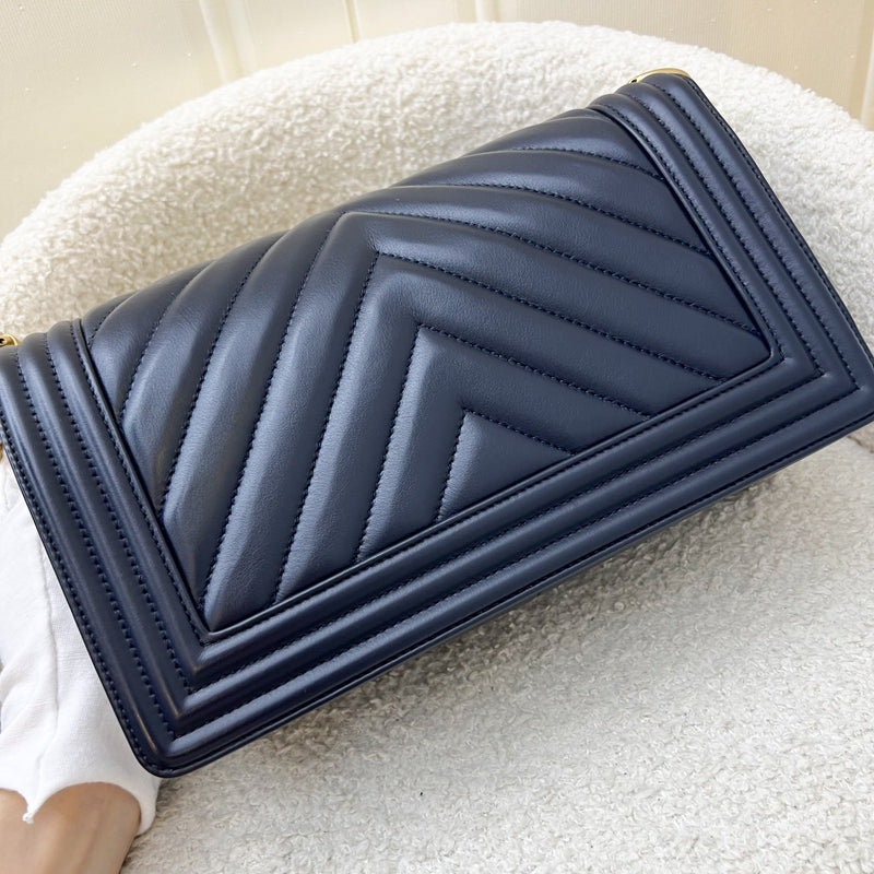 Chanel Medium 25cm Boy Flap in Chevron Quilted Navy Blue Leather and AGHW