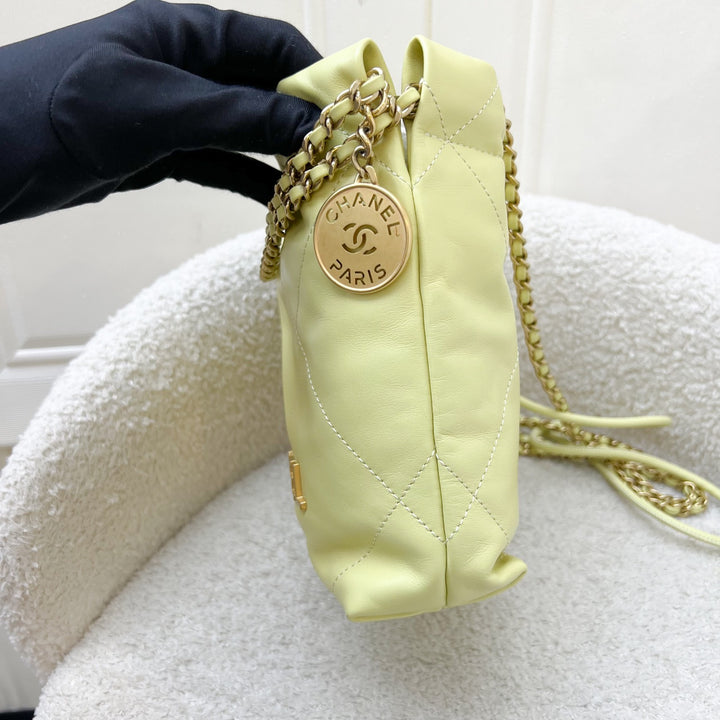 Chanel 22 Mini Hobo Handbag in Yellow Shiny Calfskin and AGHW