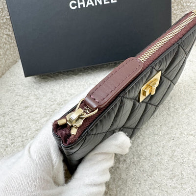 Chanel 2.55 Reissue Mini O-Case in Black Distressed Calfskin LGHW