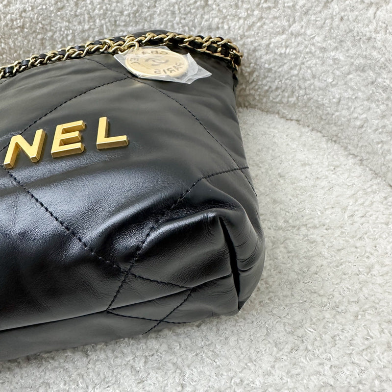 Chanel 22 Mini Hobo Handbag in Black Shiny Calfskin and AGHW