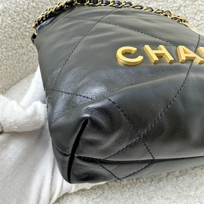 Chanel 22 Mini Hobo Handbag in Black Shiny Calfskin and AGHW