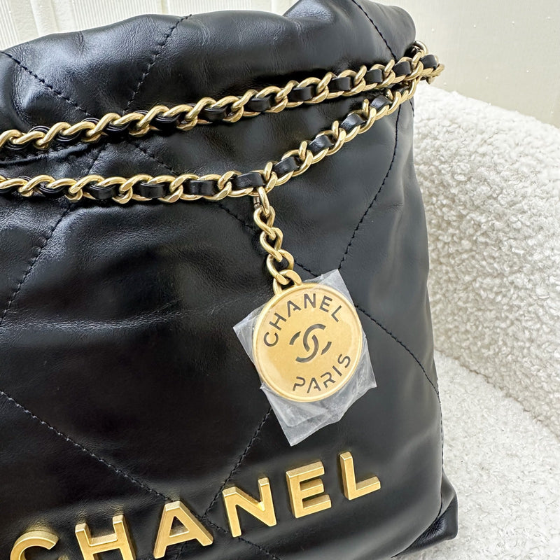 Chanel 22 Mini Hobo Handbag in Black Shiny Calfskin and AGHW