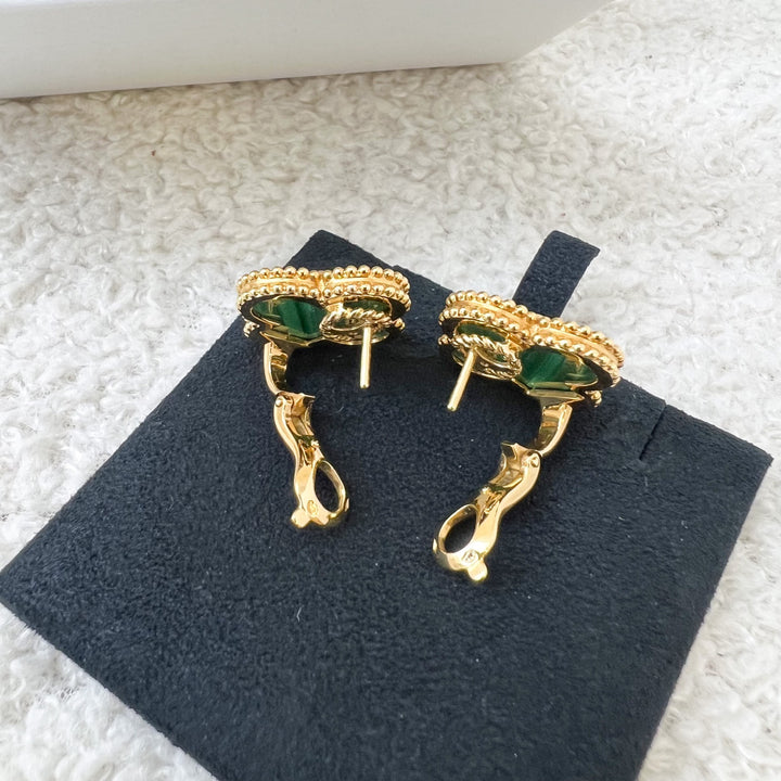 Auth Van Cleef Arpels Magic Alhambra earrings offers 18K yellow gold, Malachite