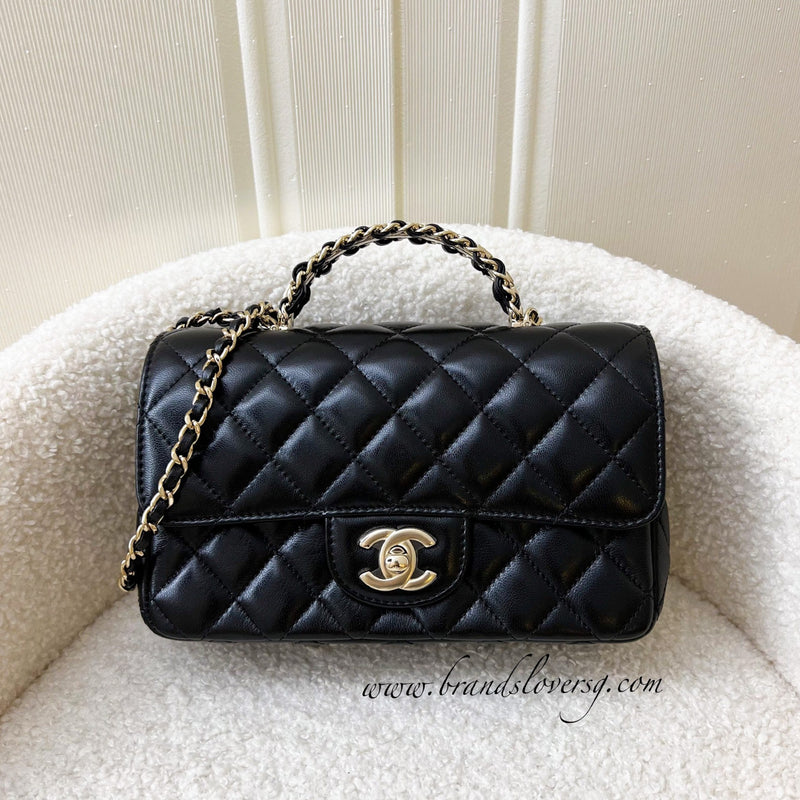 white chanel flap bag with top handle leather