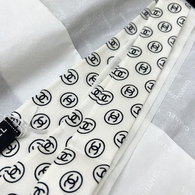 Chanel 25K Slim Bandeau with Black Logo in White Silk