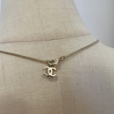 Chanel 25K Bow and Dangling Logo Necklace in SHW (Model: ABG556)