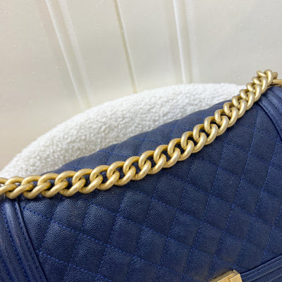 Chanel Medium 25cm Boy Flap in Midnight Blue Caviar and AGHW (Model: A67086)