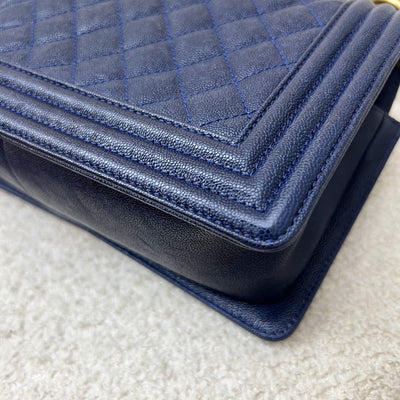 Chanel Medium 25cm Boy Flap in Midnight Blue Caviar and AGHW (Model: A67086)