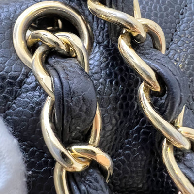 Chanel Maxi Classic Single Flap Bag in Black Caviar and GHW