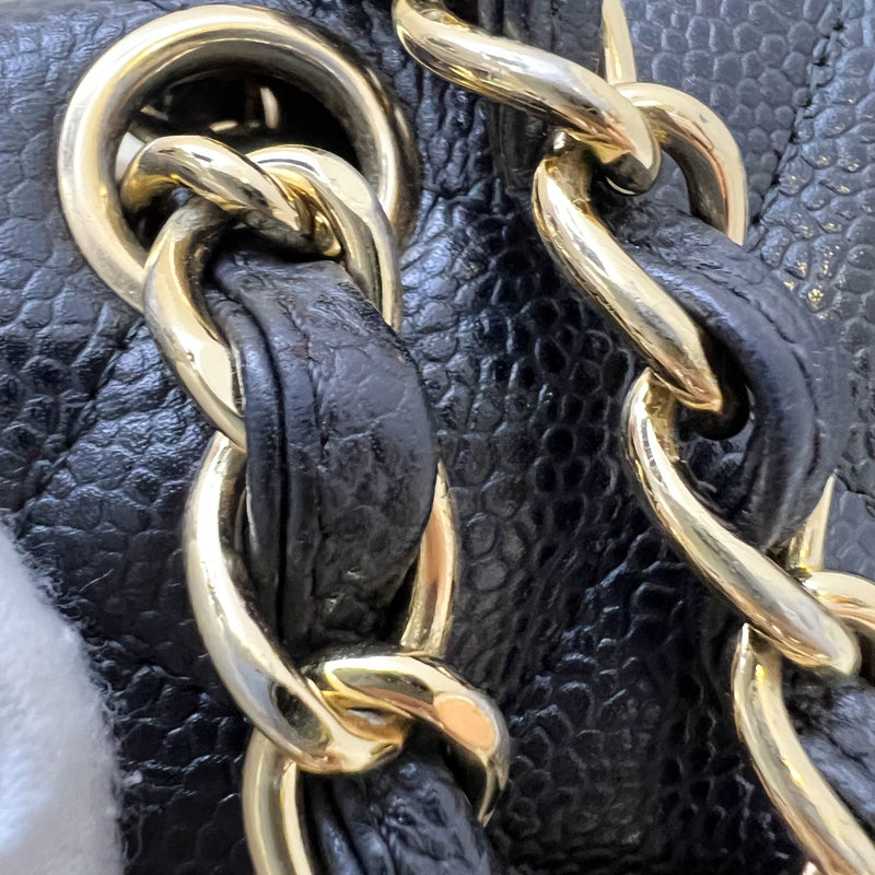 Chanel Maxi Classic Single Flap Bag in Black Caviar and GHW