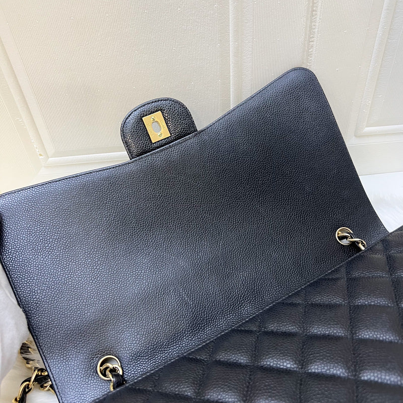 Chanel Maxi Classic Single Flap Bag in Black Caviar and GHW