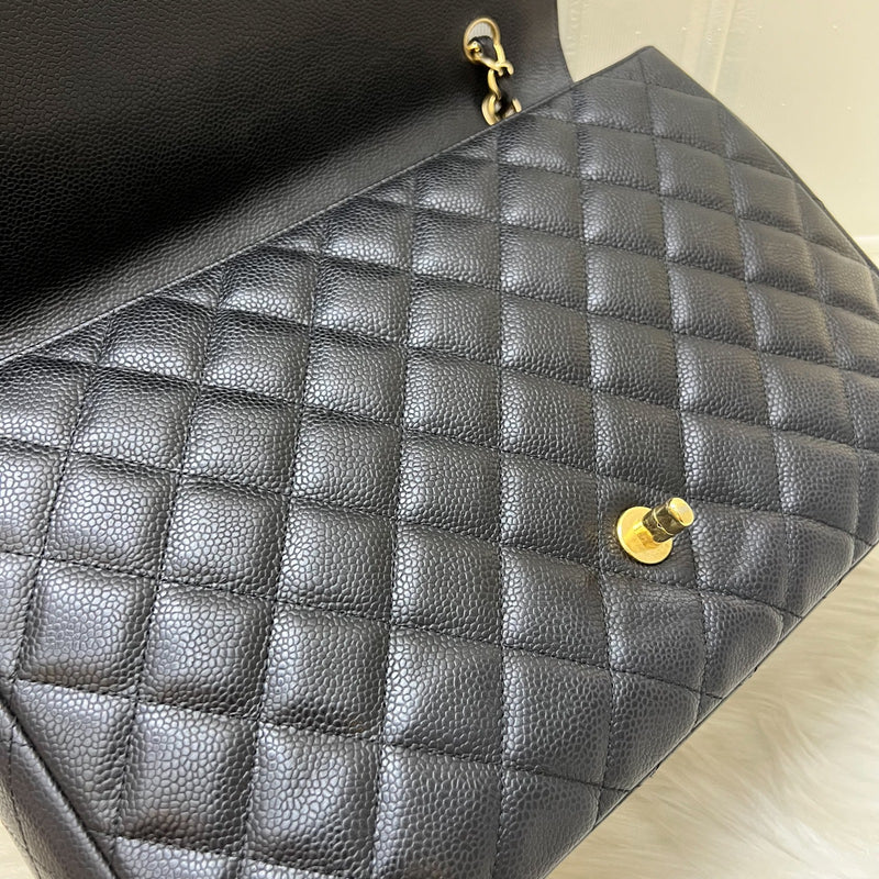 Chanel Maxi Classic Single Flap Bag in Black Caviar and GHW