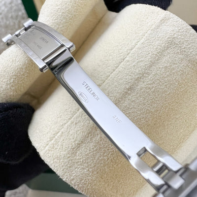 Rolex Lady's Datejust (26mm) with Silver Dial, 18K White Gold Fluted Bezel and Stainless Steel Jubilee Link Bracelet (179174)