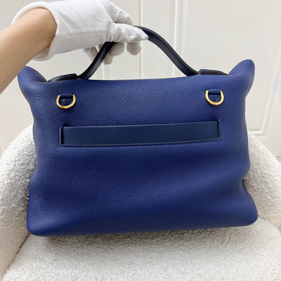 Hermes 24/24 29 Verso Bag in Bleu Saphir Maurice Leather, Navy and Sesame Swift Leather and GHW