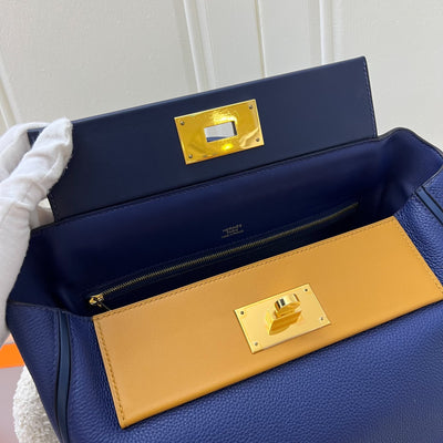 Hermes 24/24 29 Verso Bag in Bleu Saphir Maurice Leather, Navy and Sesame Swift Leather and GHW