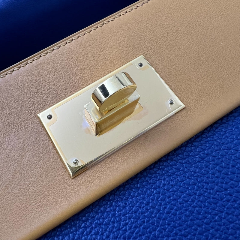 Hermes 24/24 29 Verso Bag in Bleu Saphir Maurice Leather, Navy and Sesame Swift Leather and GHW