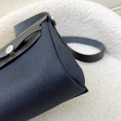 Hermes Mini Herbag Retourne in Noir Black Toile Militaire Canvas, Black Vache Hunter Leather and PHW (Includes free twilly)