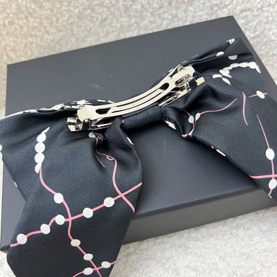 Chanel 23K Printed Pearl Motifs Bow Hair Clip in Black and Off White Fabric with Silver French Barrette