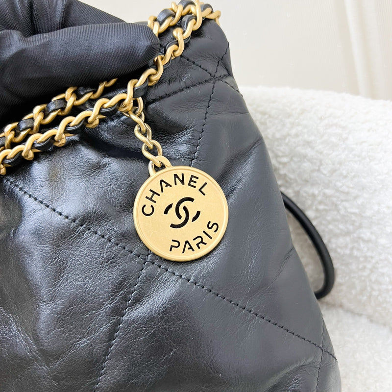 Chanel 22 Mini Hobo Handbag in Black Shiny Calfskin and AGHW