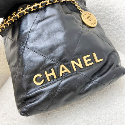 Chanel 22 Mini Hobo Handbag in Black Shiny Calfskin and AGHW