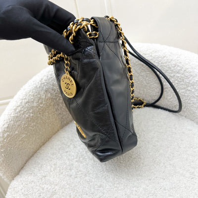 Chanel 22 Mini Hobo Handbag in Black Shiny Calfskin and AGHW
