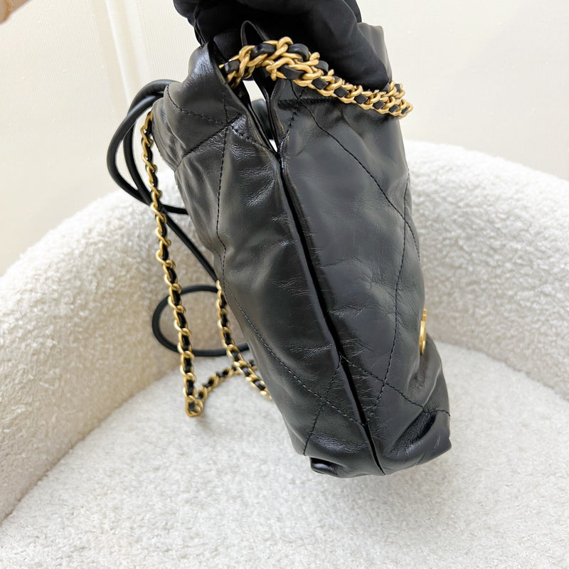Chanel 22 Mini Hobo Handbag in Black Shiny Calfskin and AGHW