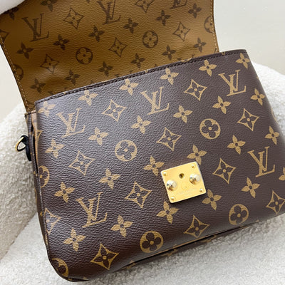 LV Pochette Metis in Reverse Monogram Canvas, Black Leather and GHW