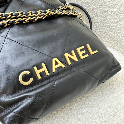 Chanel 22 Mini Hobo Handbag in Black Shiny Calfskin and AGHW