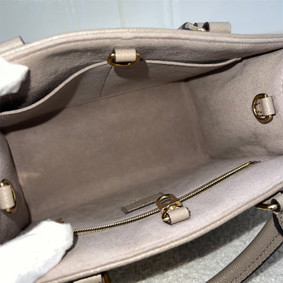 LV Onthego PM in Tourterelle (Grey) / Creme Giant Monogram Empreinte Leather and GHW