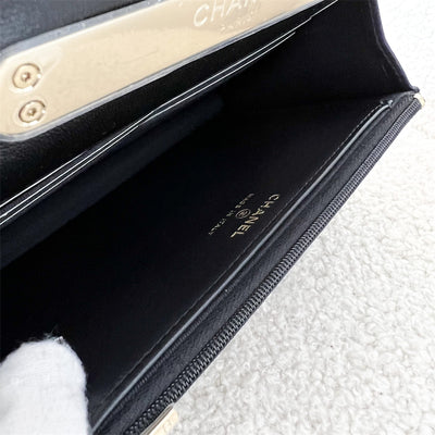 Chanel 22A Wallet on Chain WOC with Handle in Black Lambskin LGHW