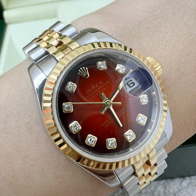 Rolex Lady's Datejust (26mm) with Vignette Red Dial with 10 Diamond Markers, 18K Yellow Gold Bezel and 18K Yellow Gold + Stainless Steel Jubilee Link Bracelet