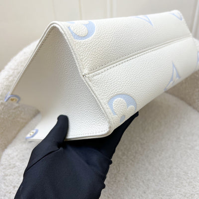 LV Milky Way Onthego PM Tote in Latte and Candy Blue Giant Monogram Empreinte Leather and GHW