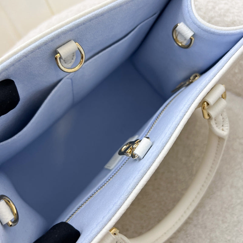 LV Milky Way Onthego PM Tote in Latte and Candy Blue Giant Monogram Empreinte Leather and GHW