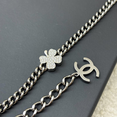 Chanel Chain Belt with CC Logo, Clover and Ribbon Charms in Gunmetal Hardware