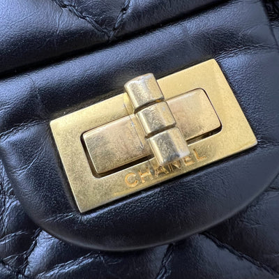 Chanel 2.55 Reissue Small 225 Flap in Black Distressed Calfskin and GHW