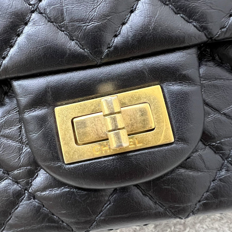 Chanel 2.55 Reissue Small 225 Flap in Black Distressed Calfskin and GHW