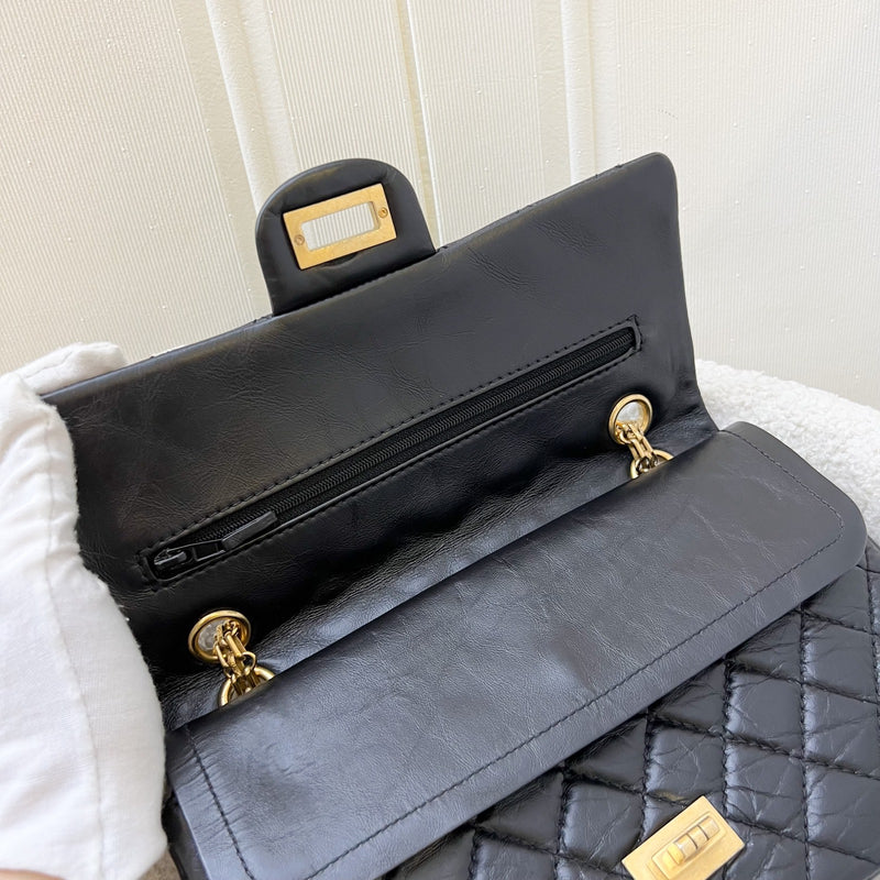 Chanel 2.55 Reissue Small 225 Flap in Black Distressed Calfskin and GHW