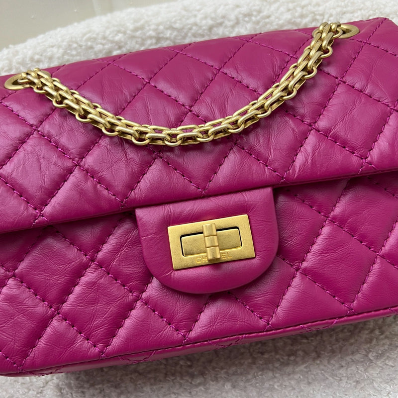 Chanel Classic 2.55 Reissue Mini Flap in Pink Distressed Calfskin and AGHW