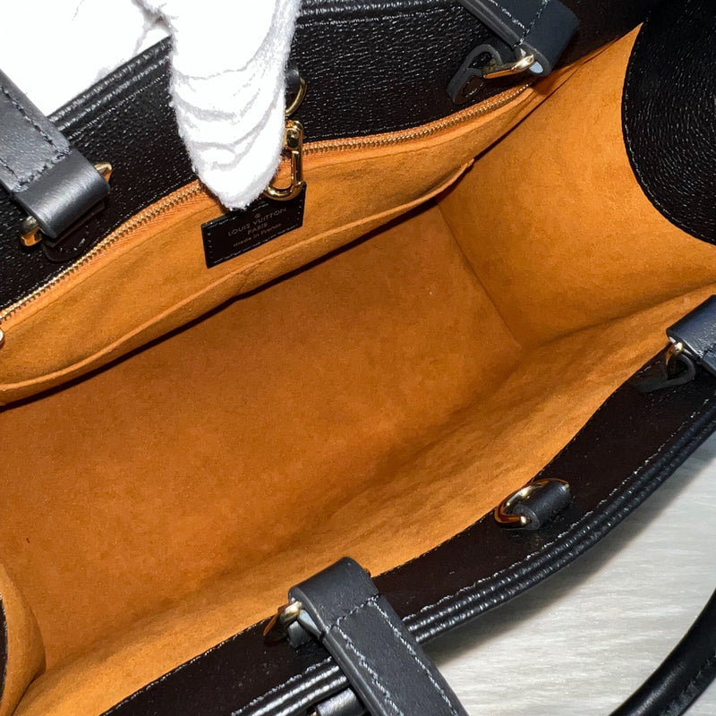 LV Onthego MM Tote in Black Empreinte Leather and GHW (Model: M45595)