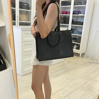 LV Onthego MM Tote in Black Empreinte Leather and GHW (Model: M45595)