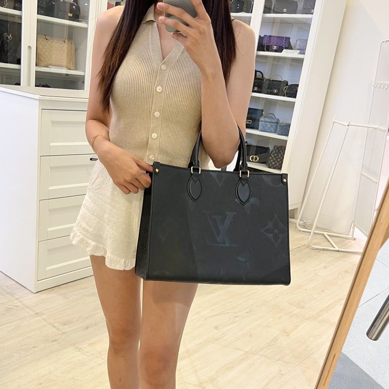 LV Onthego MM Tote in Black Empreinte Leather and GHW (Model: M45595)