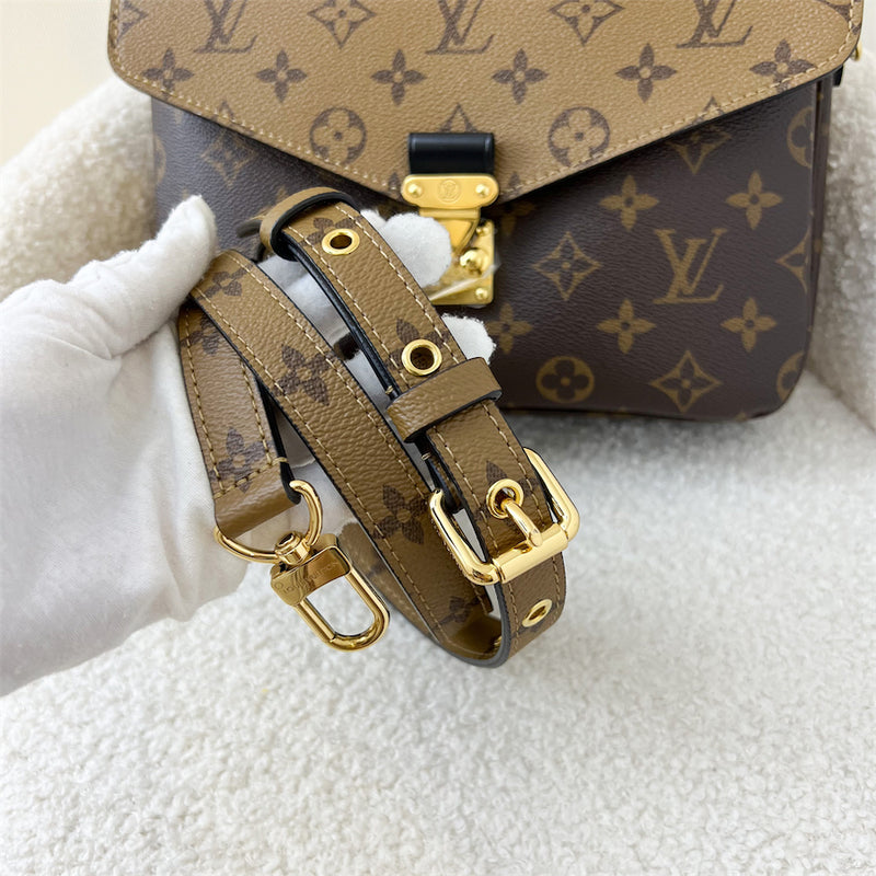 LV Pochette Metis in Reverse Monogram Canvas, Black Leather and GHW
