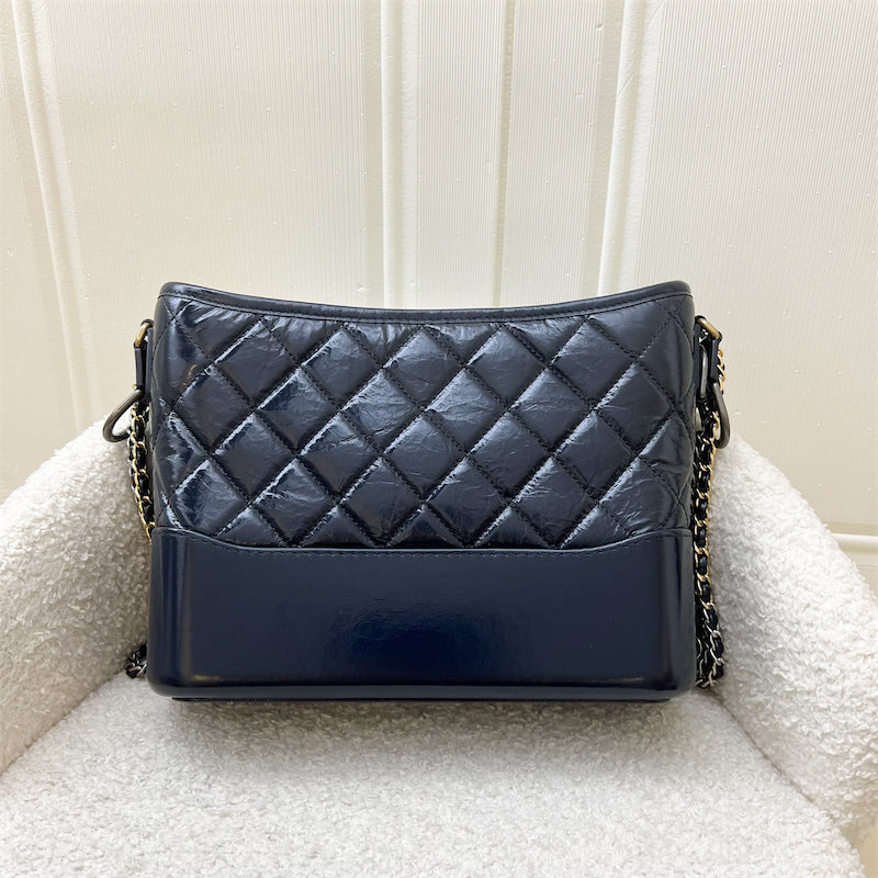 Chanel New Medium Gabrielle Hobo Bag in Midnight Blue Distressed Glossy Calfskin, Calfskin Base and 3-tone HW