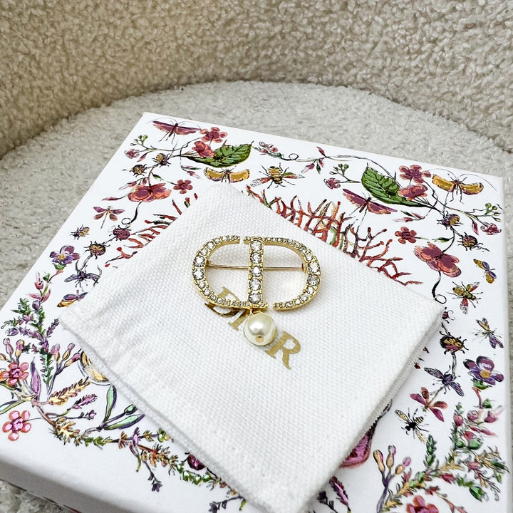 Dior Petit CD Brooch studded with Crystals and Dangling Pearl in